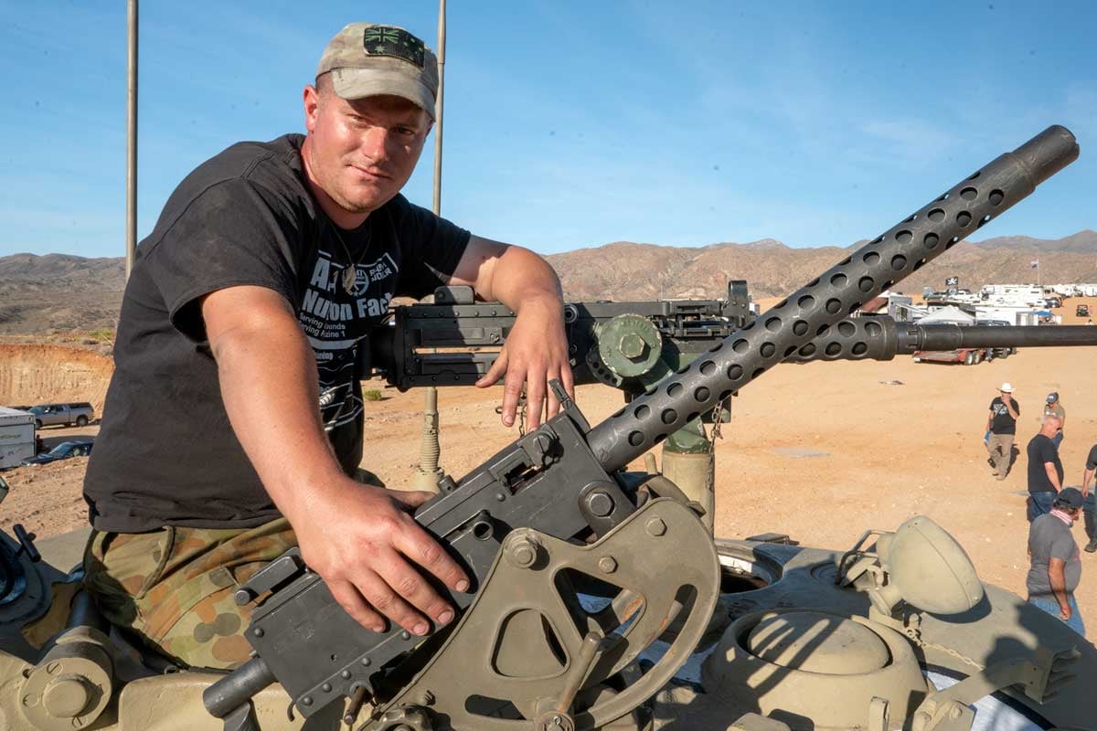 Scott Rickard sits atop the Super Sherman next to an M1919