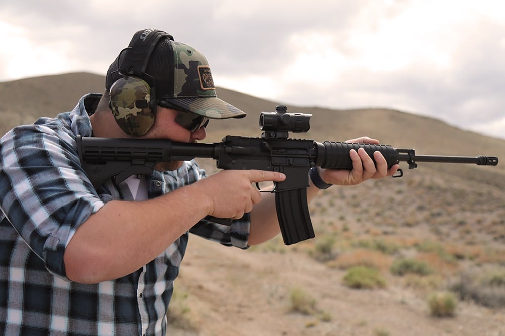 Bushmaster M4 QRC being fired in the desert