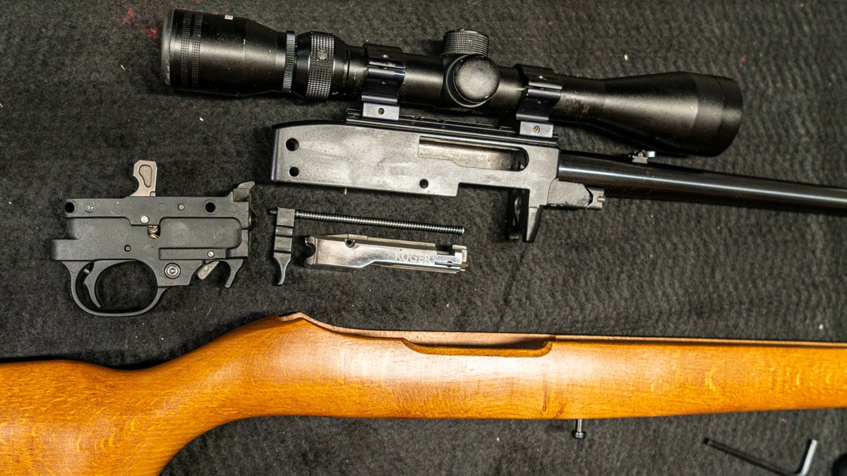 Disassembled Ruger 10/22 rifle on a table