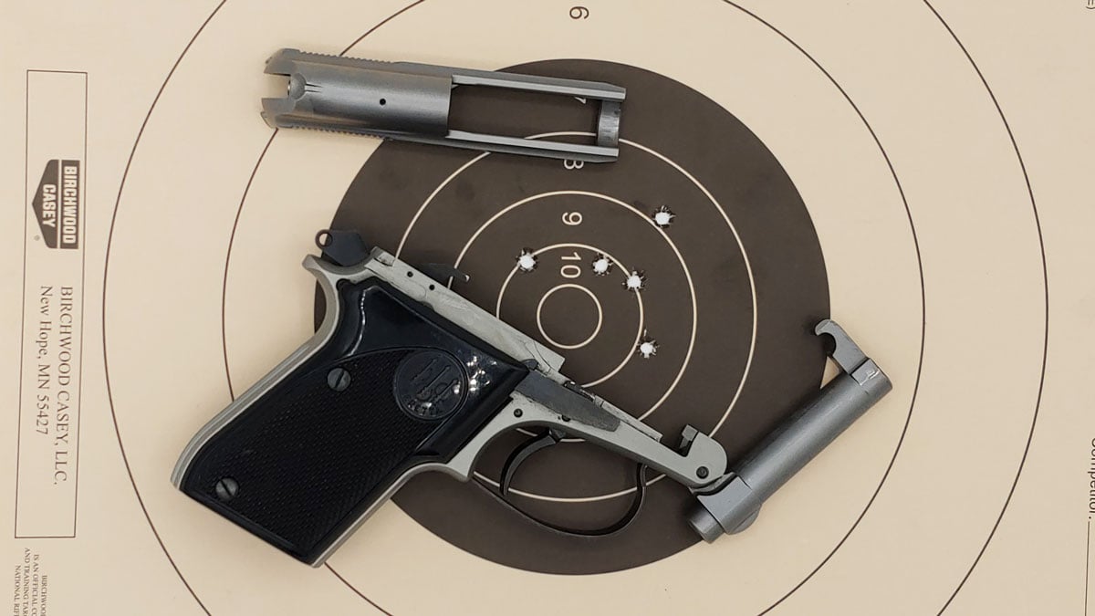 Beretta 21A pistol with target