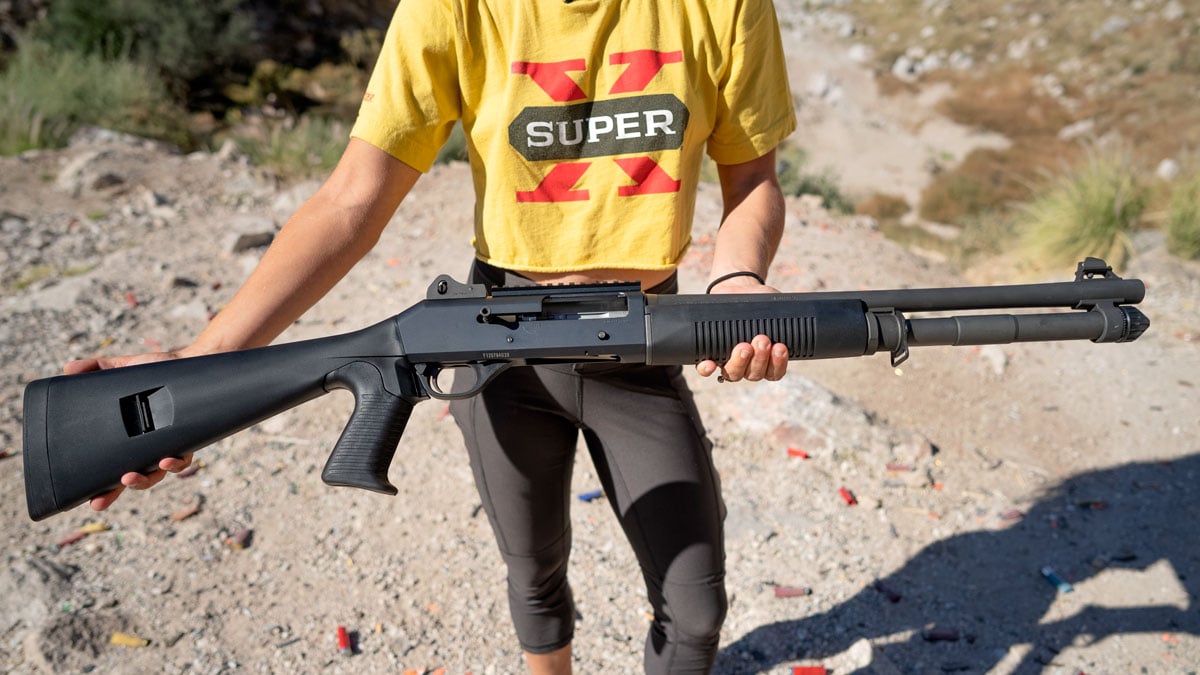 A shooter holds a Benelli M4 Shotgun