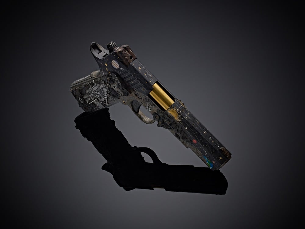 Cabot Guns Moonshot 1911 one-of-a-kind .45 made out of a lunar rock displayed on a black background
