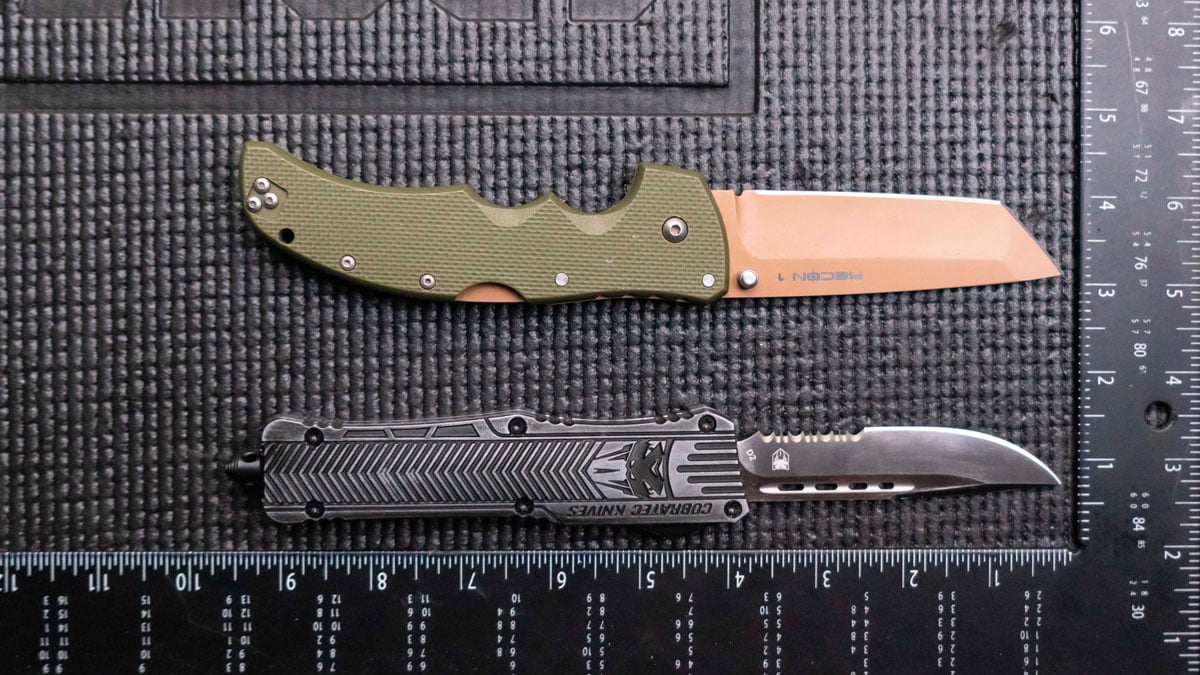 Folding knife and OTF knife on a table