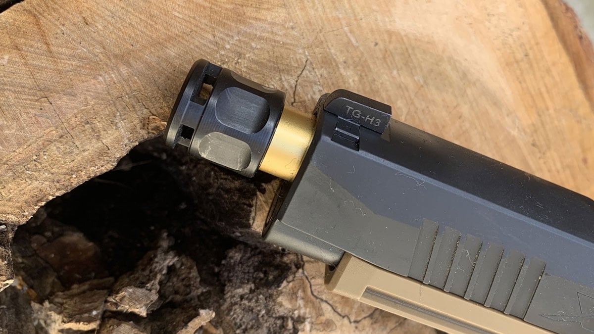Pistol with compensator