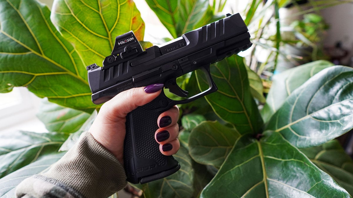 Woman with Walther PDP handgun