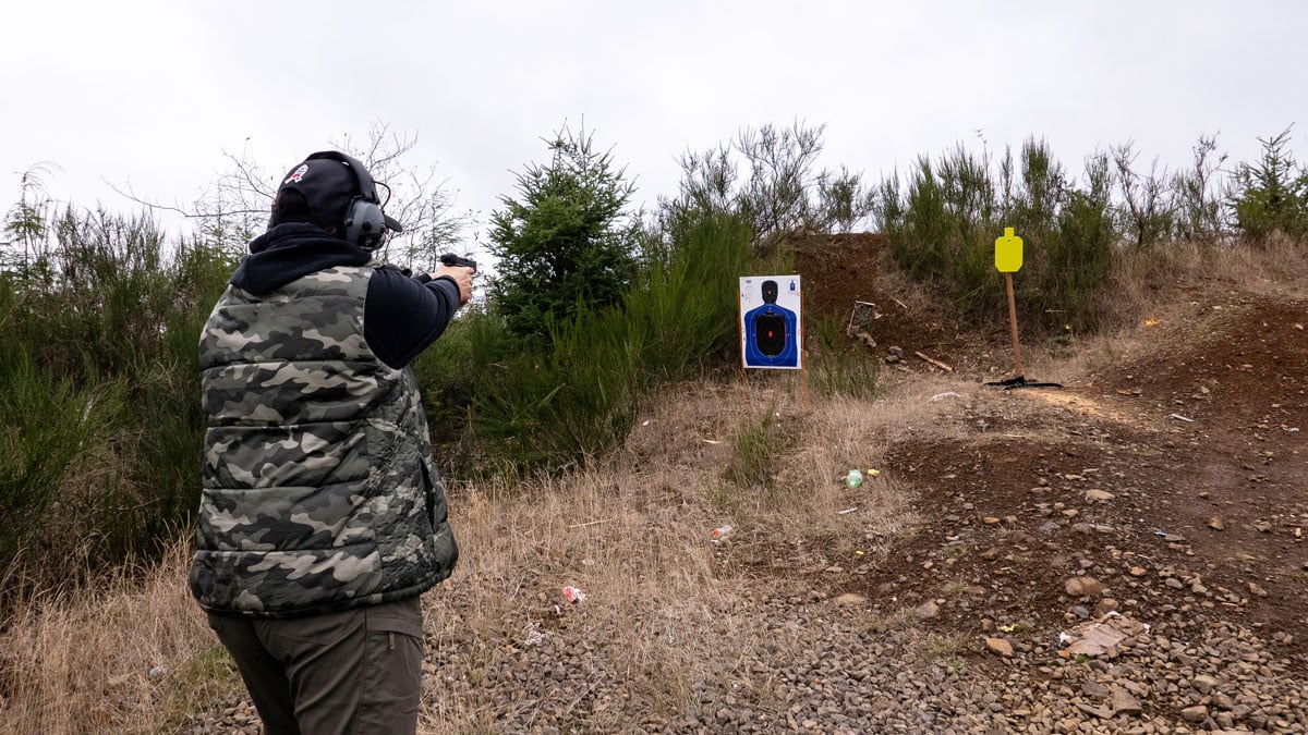 Woman shooting at the range