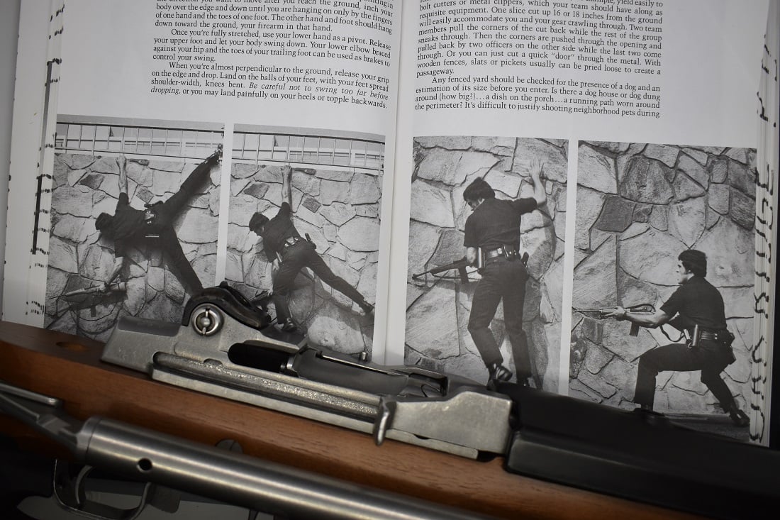 Ruger Mini-14 against book detailing the spider drop method