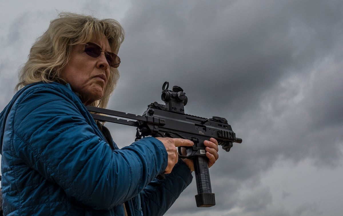Special Agent Jacqueline Solmos, a CID Special Agent with the 733rd Military Police Battalion (CID), fires the APC9K submachine gun at Joint Base McGuire-Dix-Lakehurst