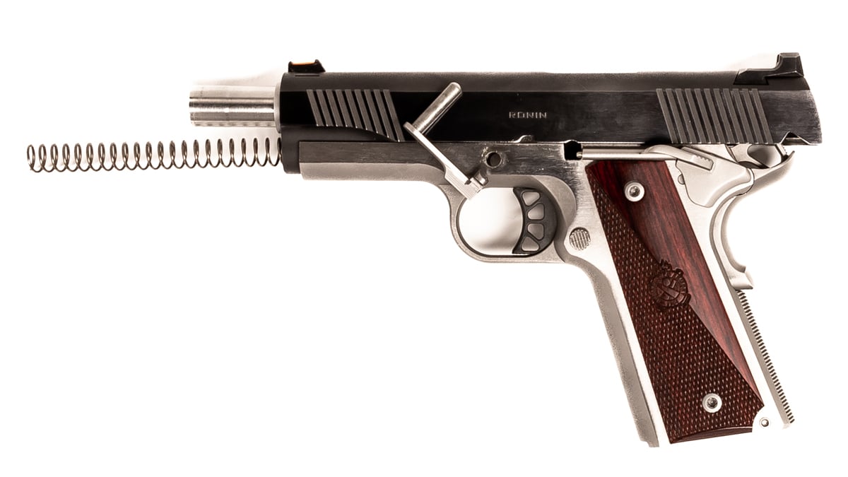 1911 with takedown pin pulled out