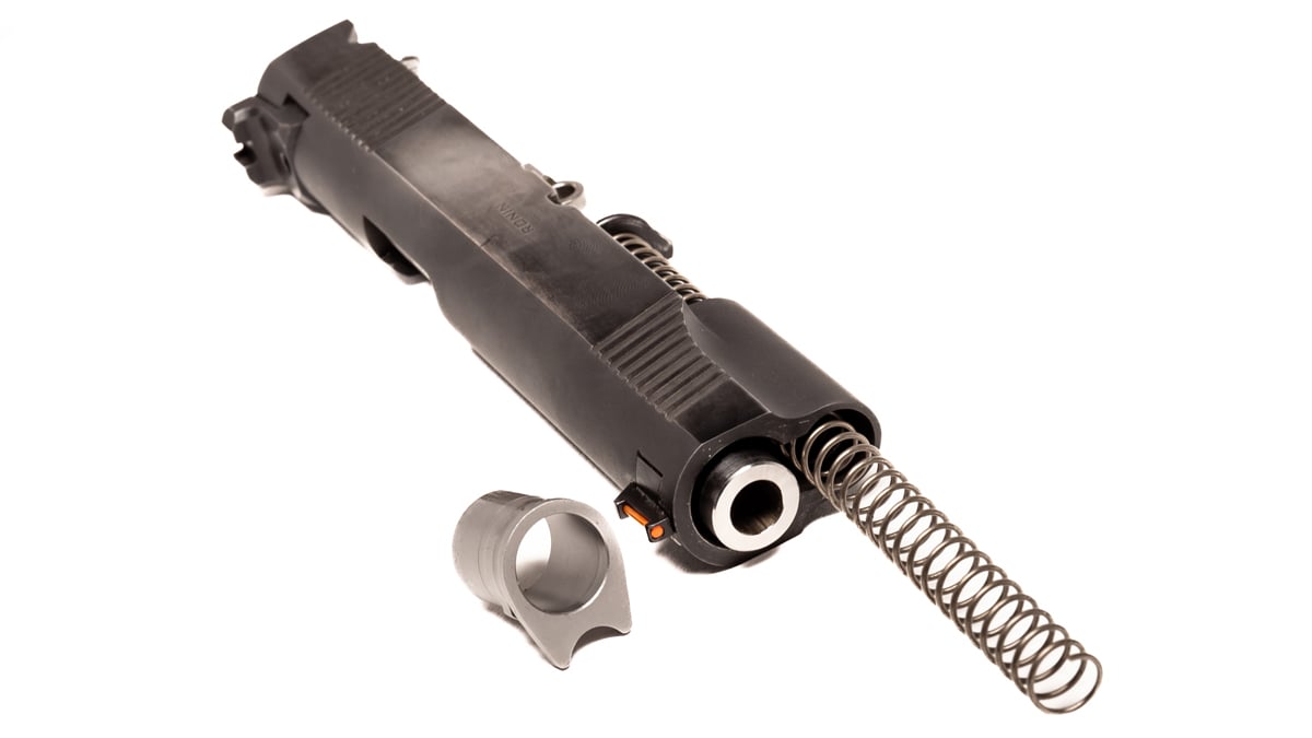 1911 barrel removed with pieces next to it