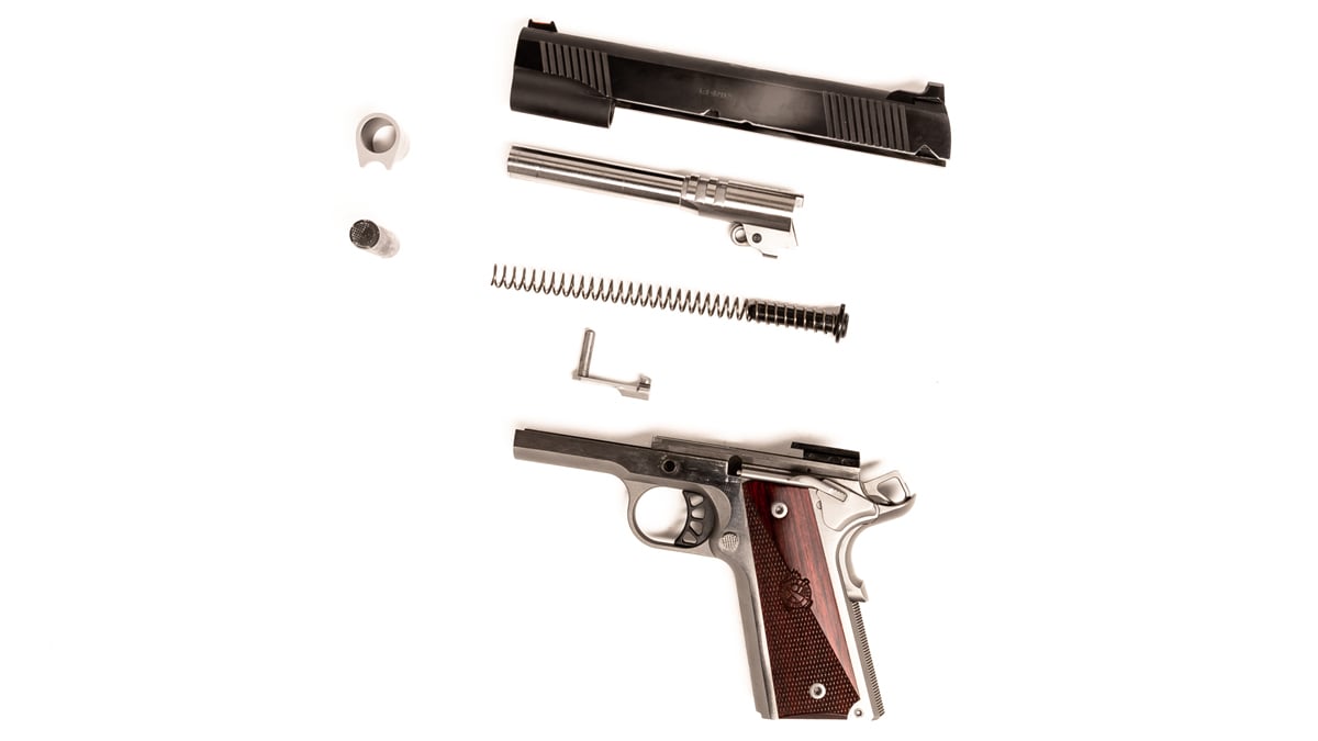 1911 pistol pieces laid out separately