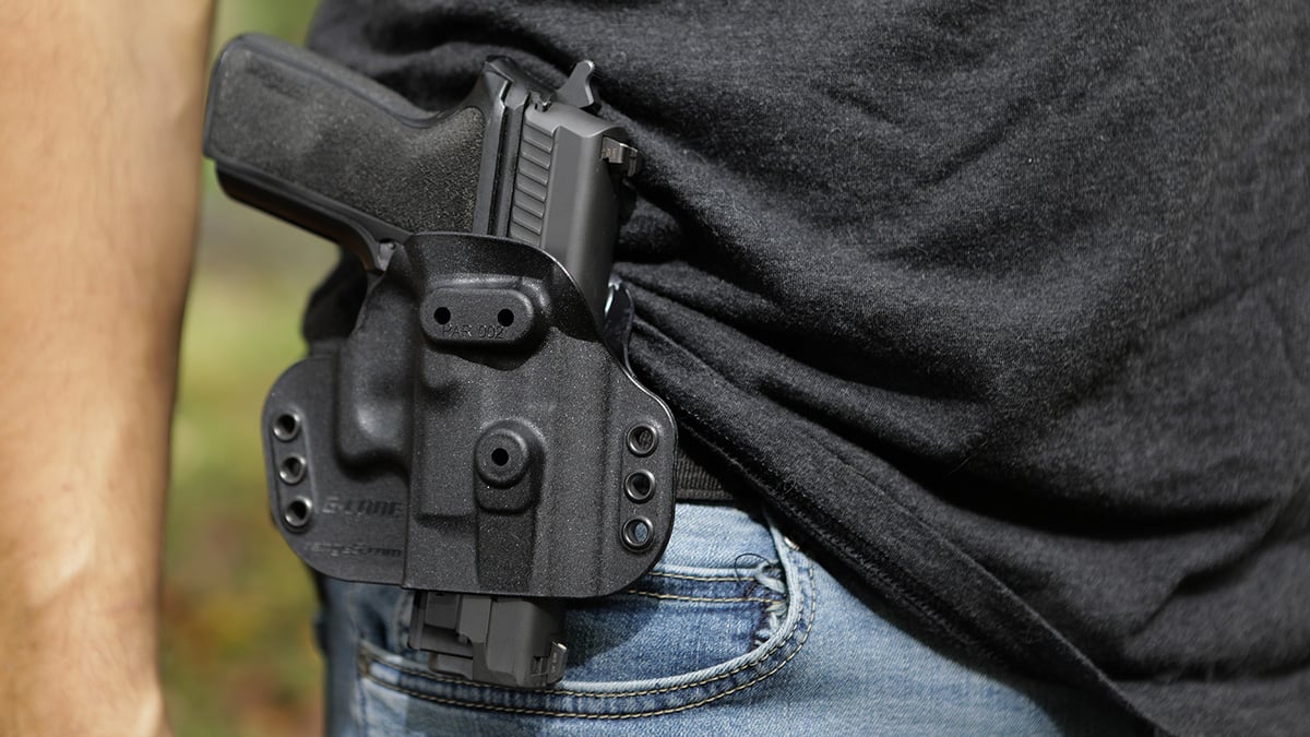 SIG Sauer P229 .40 S&W handgun in holster