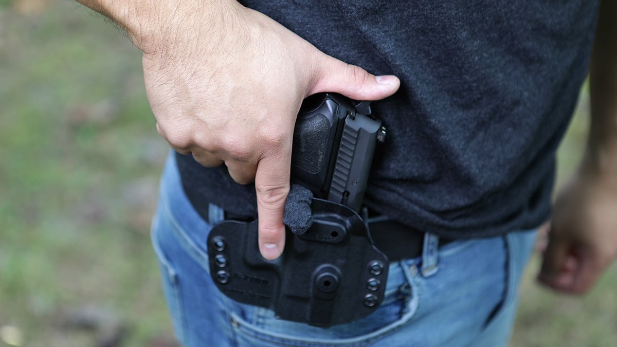 SIG Sauer P229 .40 S&W handgun in holster