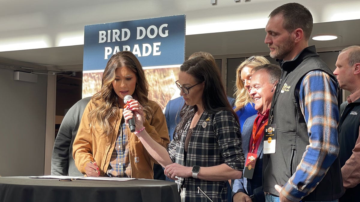 South Dakota Governor Kristi Noem signs the Habitat License Plate bill