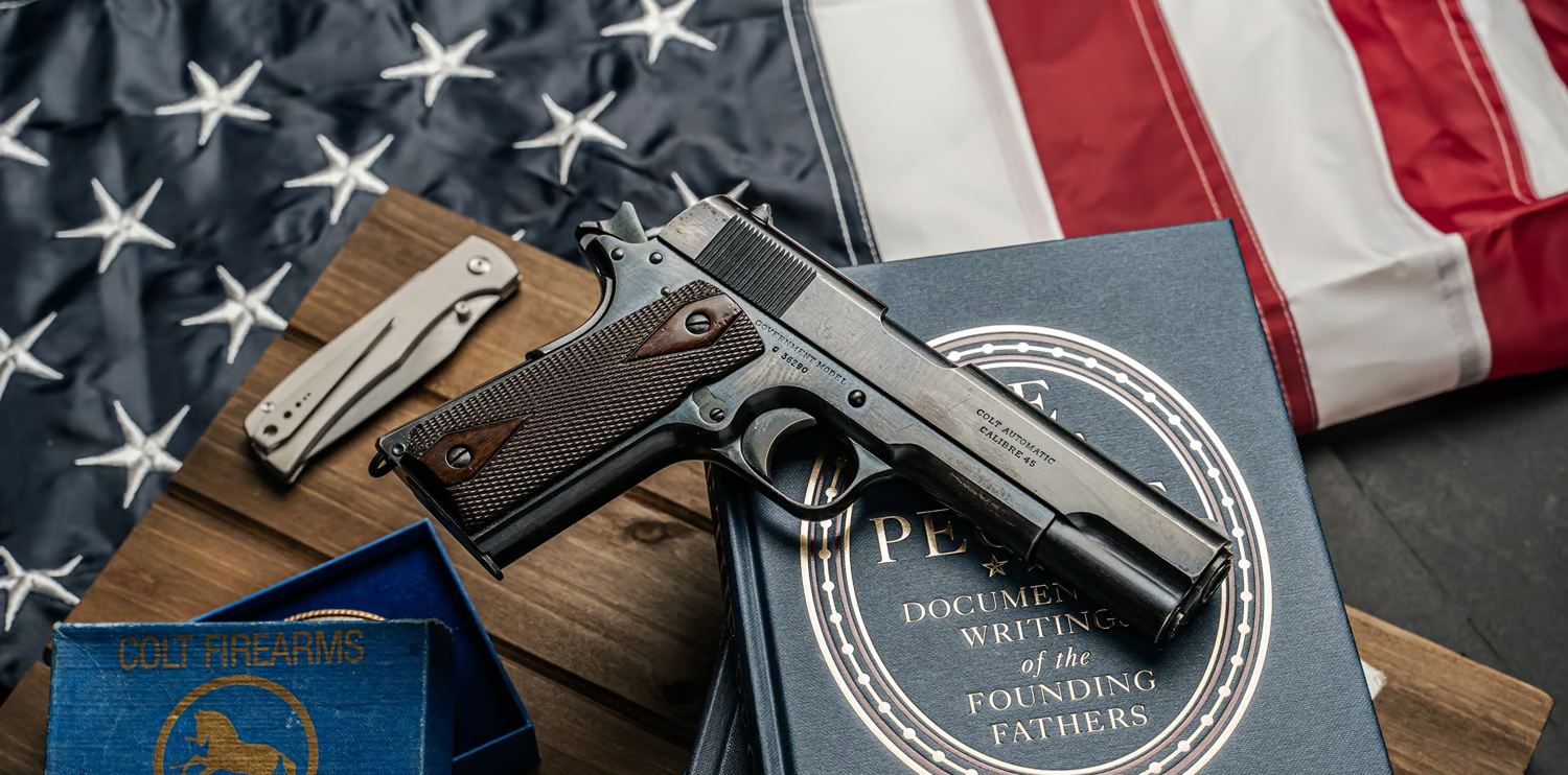 Colt Gov't 1911 with Americana memorabilia