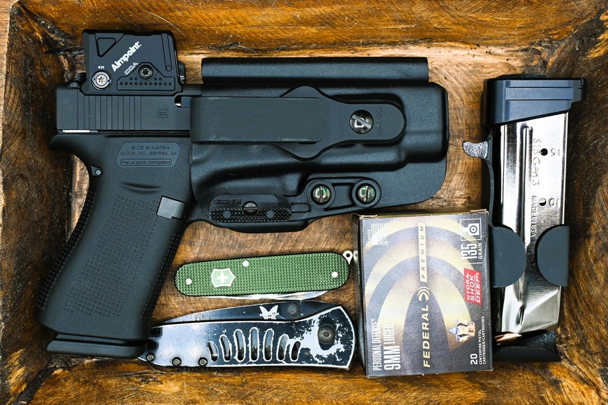 Glock 48 9mm pistol with Aimpoint COA red dot