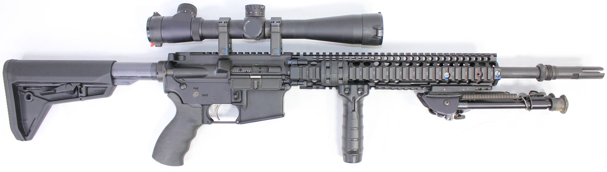 LMT Defense LMT Defender 2000 5.56 18" Spr Noveske Leupold Mark 4 Lrt 3.5-10x40 Scope Aac Miter Fh ECOM00435116 524609