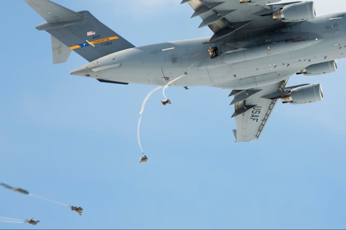 paratroopers jump from C-17