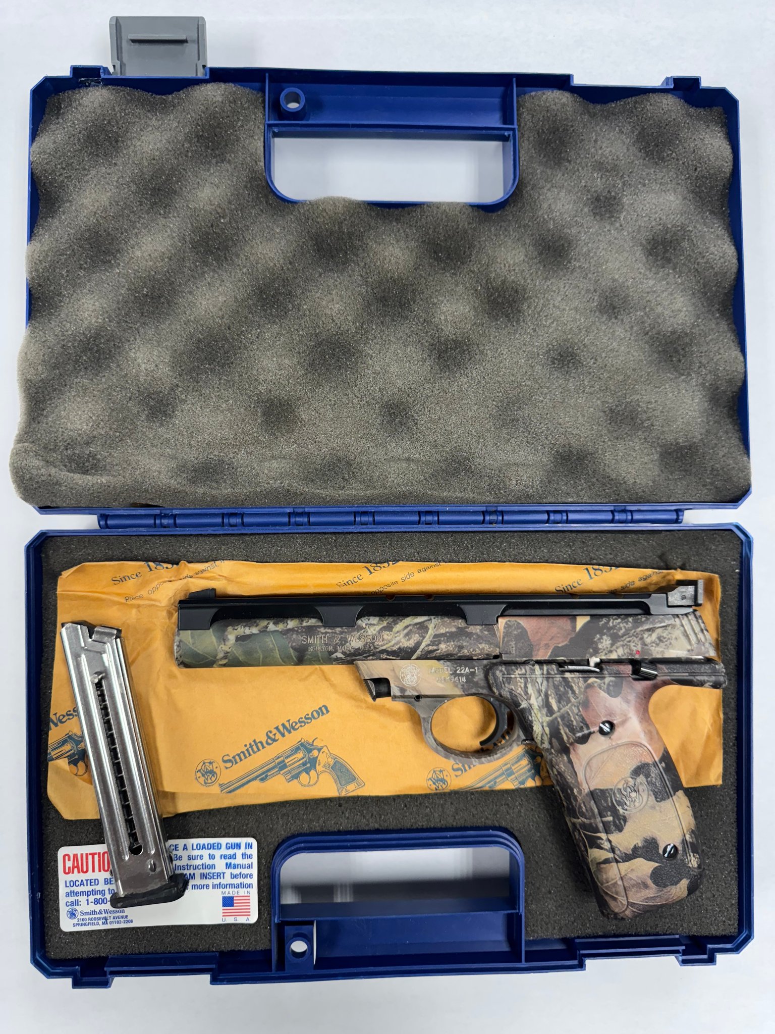 SMITH & WESSON 22A-1 semi-auto pistol angled view with original box and magazine
