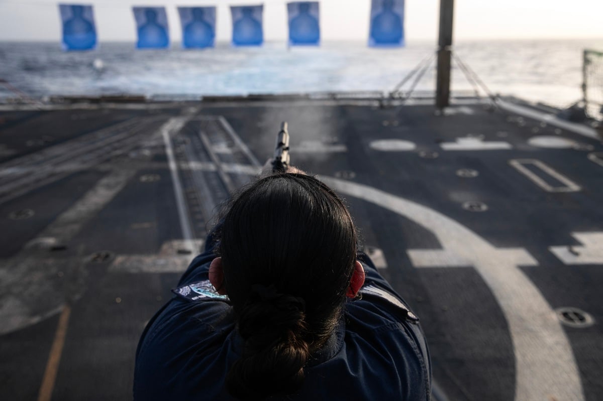 M9 Beretta 9mm being used on the Arleigh-Burke class guided-missile destroyer USS Wayne E. Meyer (DDG 108)