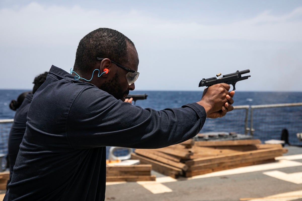 M9 Beretta 9mm being used on the Arleigh-Burke class guided-missile destroyer USS Wayne E. Meyer (DDG 108)