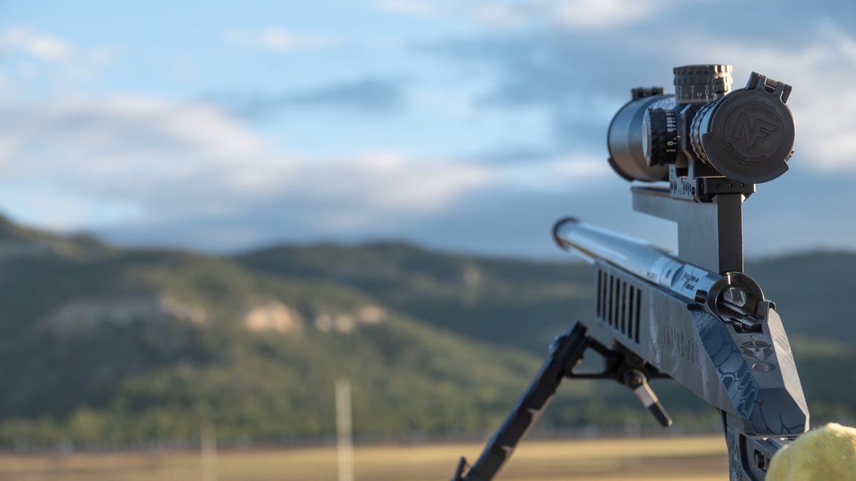 ELR rifle with scope pointed downrange