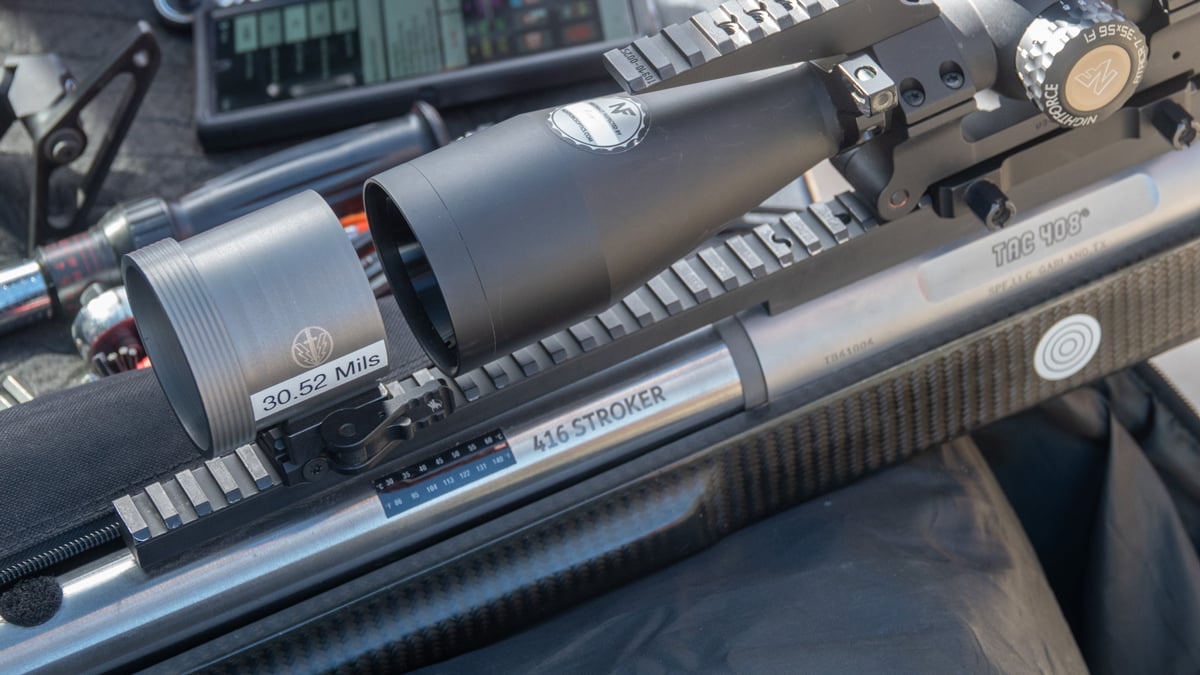 scope and prism on rifle