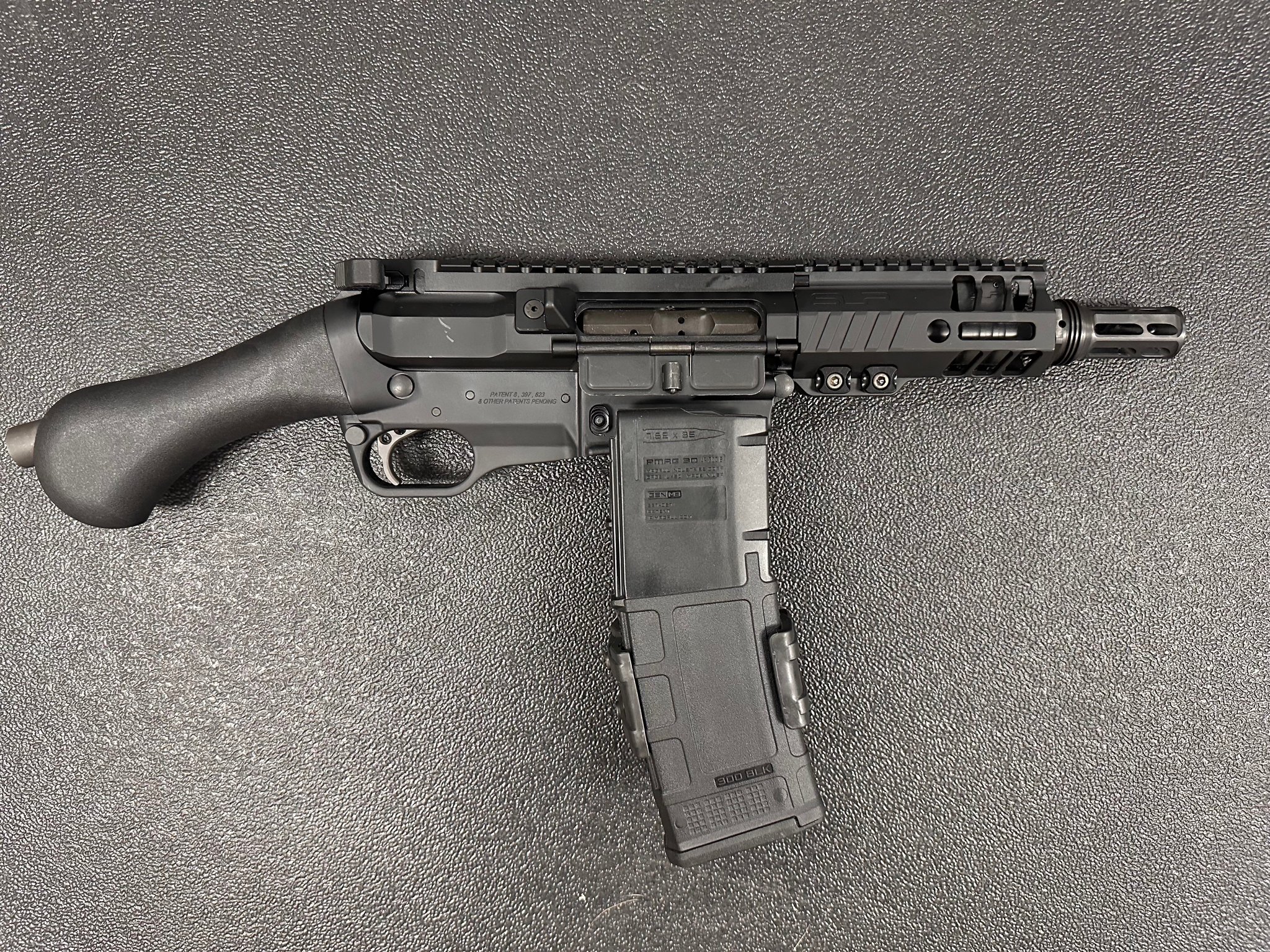 FIGHTLITE INDUSTRIES SCR side view with SLR handguard and muzzle device
