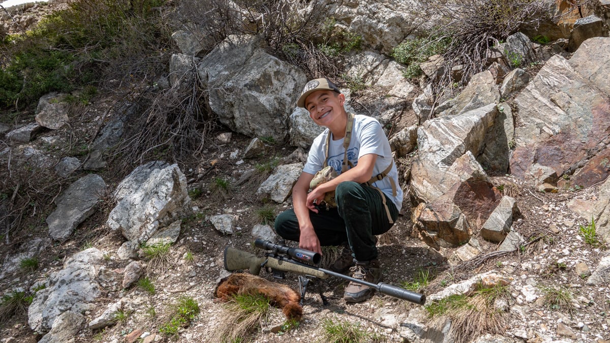youth with marmot shot with .22 ARC rifle
