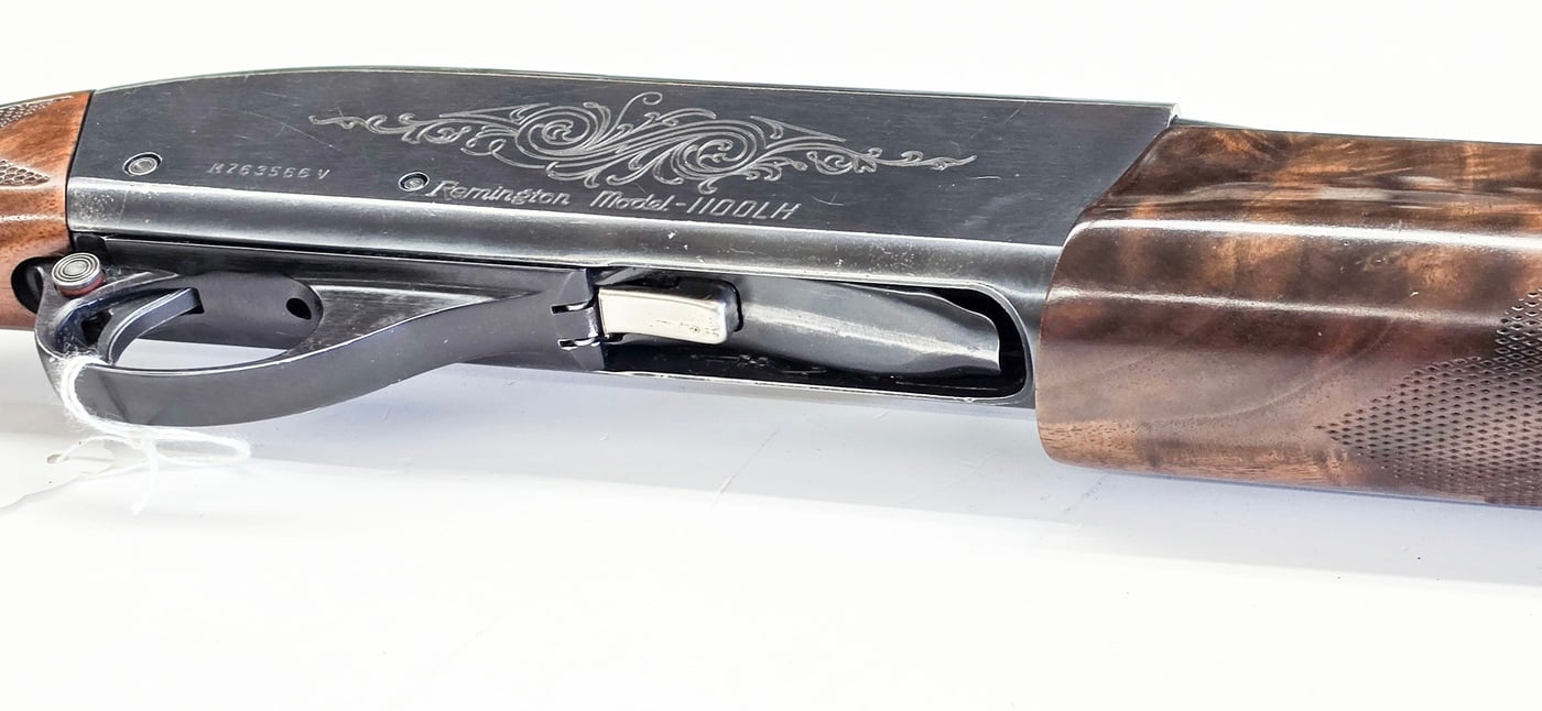 REMINGTON LEFT-HANDED 1100 SEMI-AUTO CHAMBERED IN 12 GAUGE HAS SOME HISTORY BEHIND IT !!