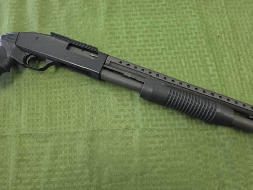 MOSSBERG 500 SHOTGUN