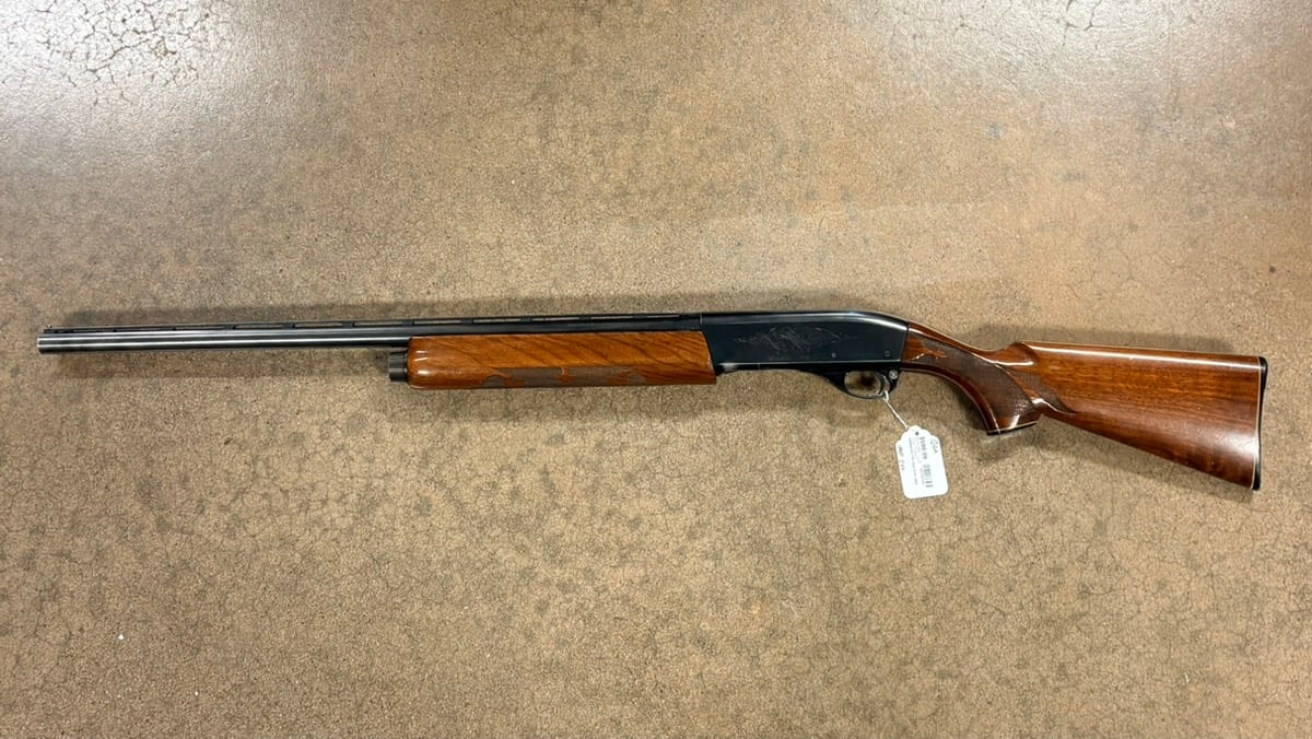 REMINGTON 1100 SHOTGUN