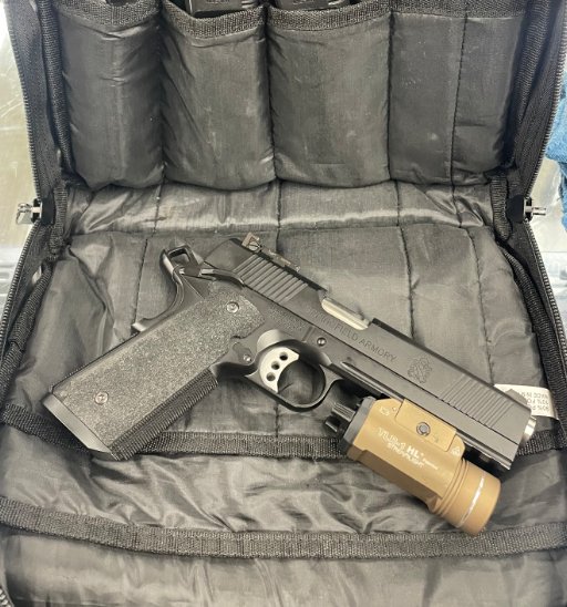 SPRINGFIELD ARMORY Black Springfield TRP Operator, 5" barrel, 45 ACP, Handgun, Semi Auto, (1) 8 round mag, (2) 7 round mags, (3) 10 round mags, Streamligt TLR-1 FDE, OEM Case & Cable Lock