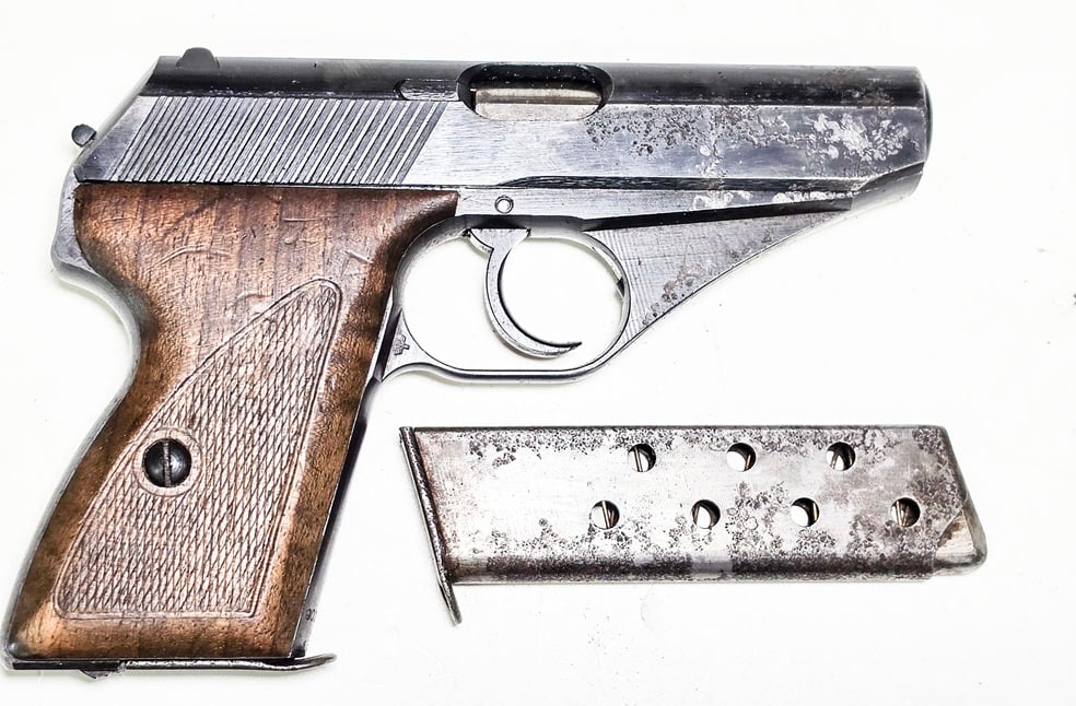 MAUSER MODEL HSC  WITH AN EAGLE BEHIND THE TRIGGER