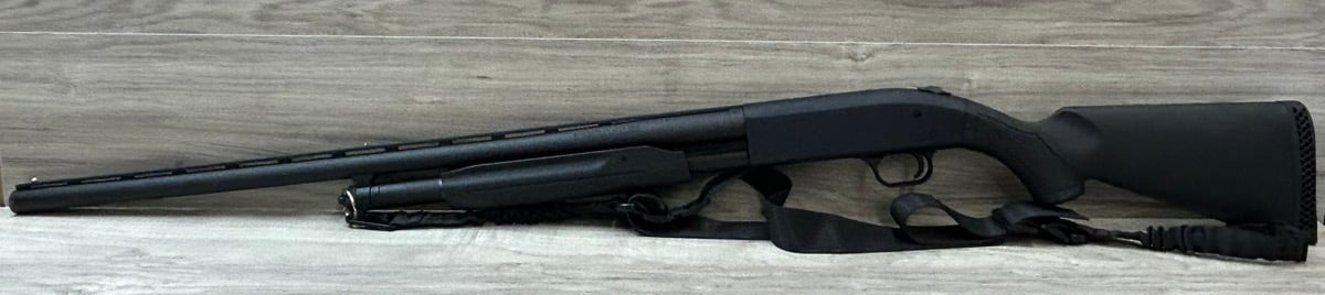 MOSSBERG 500 SHOTGUN