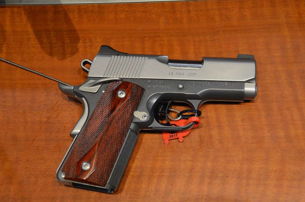 Kimber's new and very compact Ultra CDP (Custom Defense Package) is available in .45ACP ($1,173) or 9mm ($1,194) and features a flush-cut barrel, extensive carry melting, aluminum frame and rosewood grips. Weight is just 25 ounces.