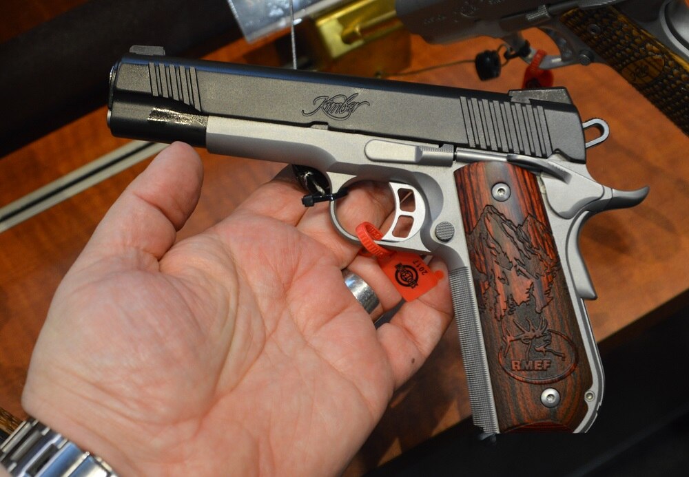 New for 2017 is the Camp Guard 10, a striking two-tone 10mm Auto offered in conjunction with the Rocky Mountain Elk Foundation for those who venture into the backcountry. The cosmetics of RMEF-marked carved rosewood grips and a round heel frame are balanced by the more hard-serving matte black slide and Tactical Wedge 3-dot tritium night sights. MSRP is $1,228.