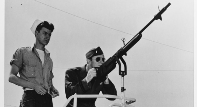Lt. JG Rothschild on the skeet range at NAS Saint Louis, Missouri, April 1944. The "machine gun" is a Remington Model 11 on a Mk. 1 Mod. 0 mount. They are using Peters "Victor" brand paper hulled shells. (Photo: U.S. Navy)