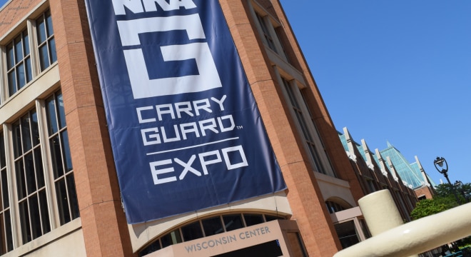 The ginormous &ldquo;NRA Carry Guard&rdquo; sign draped down the front entrance of the Wisconsin Center in Milwaukee on Friday, Aug. 25, 2017. (Photo: Daniel Terrill/Guns.com)