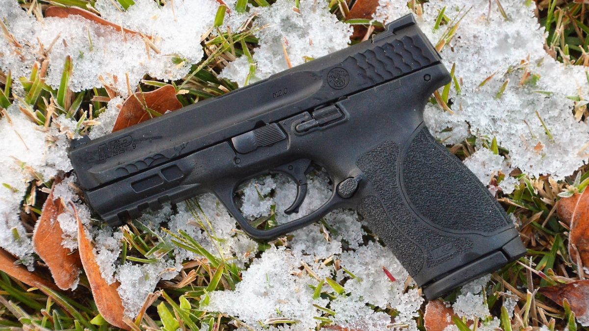 S&W M&P Compact 2.0 9mm pistol in the snow