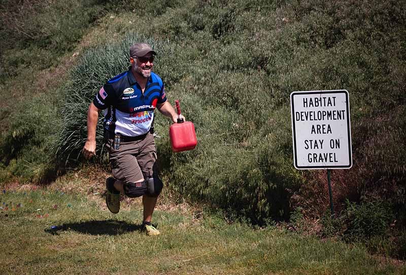 ryan muller runs a gas can to refuel