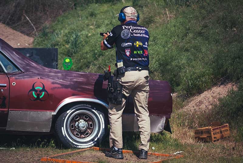 jerry miculek shooting at the outdoor zombie range