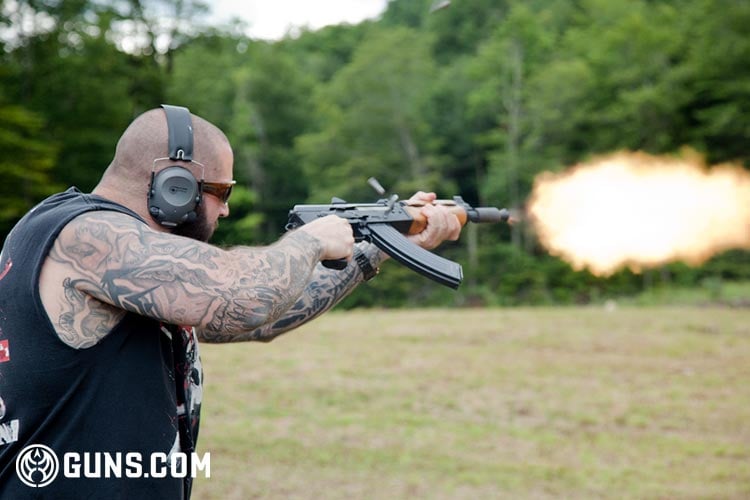 Douglas Wood firing an AK-47