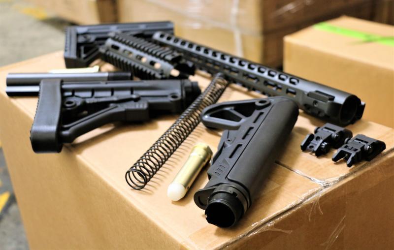 According to CBP, the parts included a mix of sights, stocks, muzzles, brakes, buffer kits, and grips (Photo: CBP)